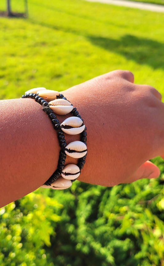 Ade's Exquisite Cowrie Shell Bracelet: A Timeless Statement of Culture and Elegance
