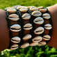 Ade's Exquisite Cowrie Shell Bracelet: A Timeless Statement of Culture and Elegance