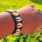 Ade's Exquisite Cowrie Shell Bracelet: A Timeless Statement of Culture and Elegance